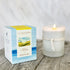 Candle and packaging labeled &